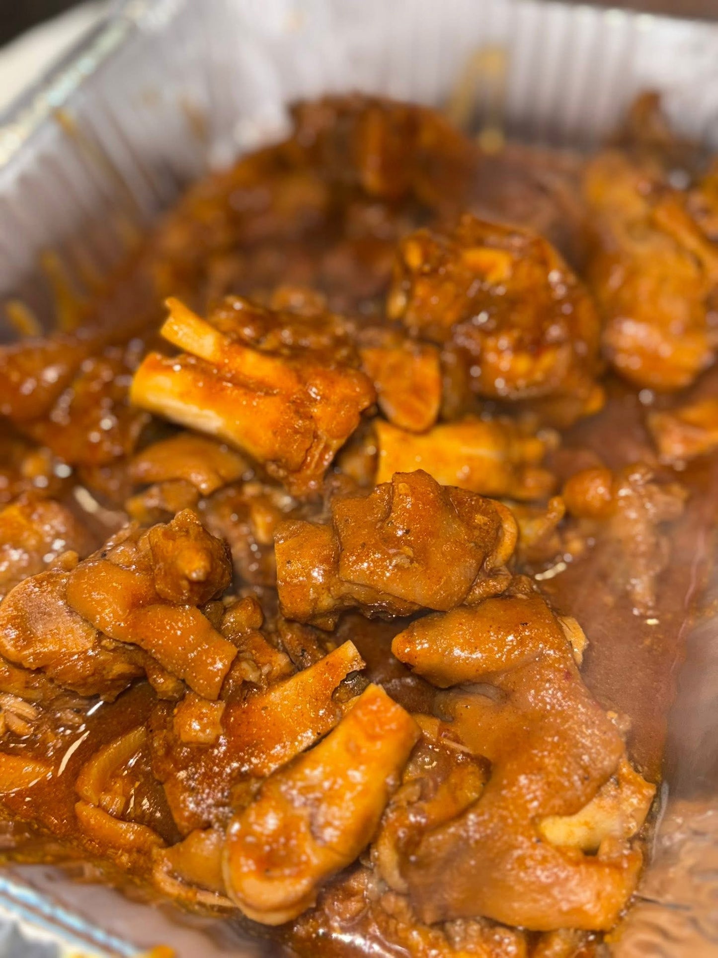 Pig feet bag  with  corn &potatoes & side  of cooked rice